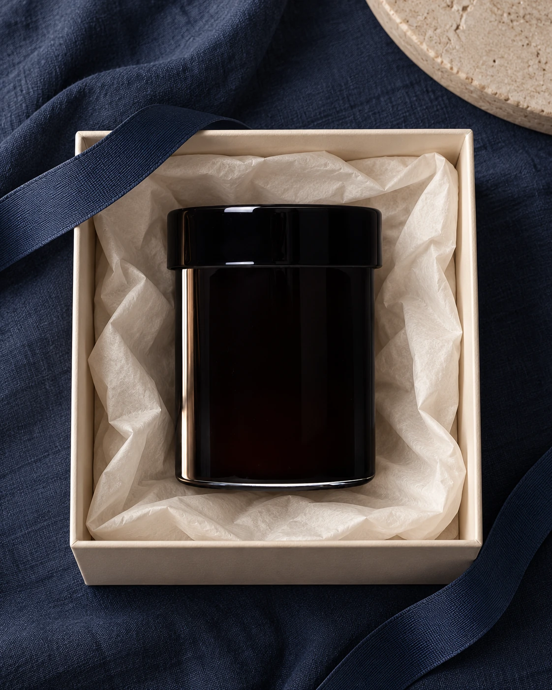 Black lidded vessel in Gift presentation